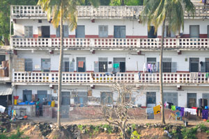 Three-story building as seen from the viewing platform of Nana Bema hotel