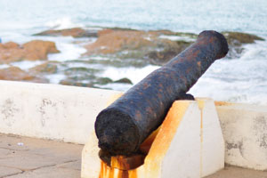 Two ancient cannons are rusted