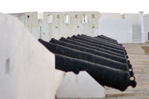 A series of cannons is in the Cape Coast castle