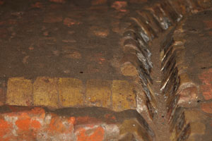 The tunnel on the floor was a drainage for feces and urine of the slaves