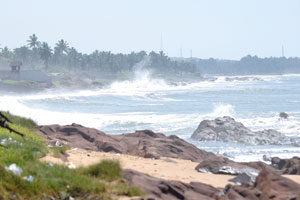 Choppy waves of the Atlantic Ocean are washing the shores of Elmina town