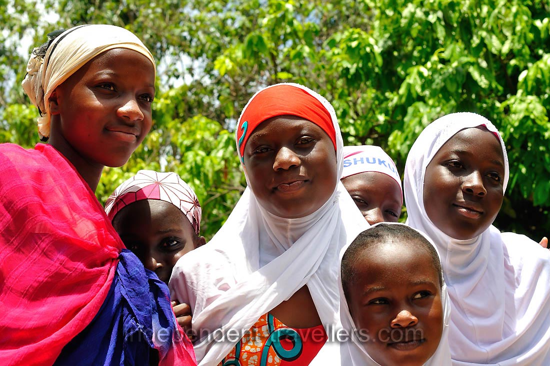 A group of schoolgirls is near the Manhyia Palace Museum