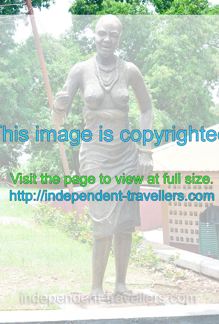 A statue of an African woman with bare breasts is in the Centre for National Culture