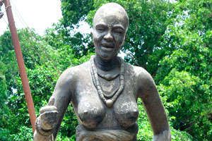 A statue of an African woman with bare breasts is in the Centre for National Culture