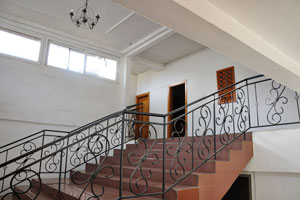 A staircase is in Georgia Hotel