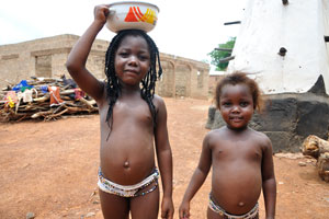 Little girls are in the village of Larabanga