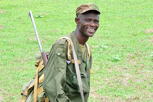 One of the rangers is widely smiling