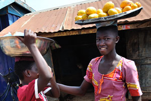 Teenage female fruit vendors are from Yendi