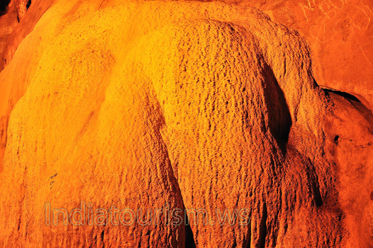 thick orange stalagmite