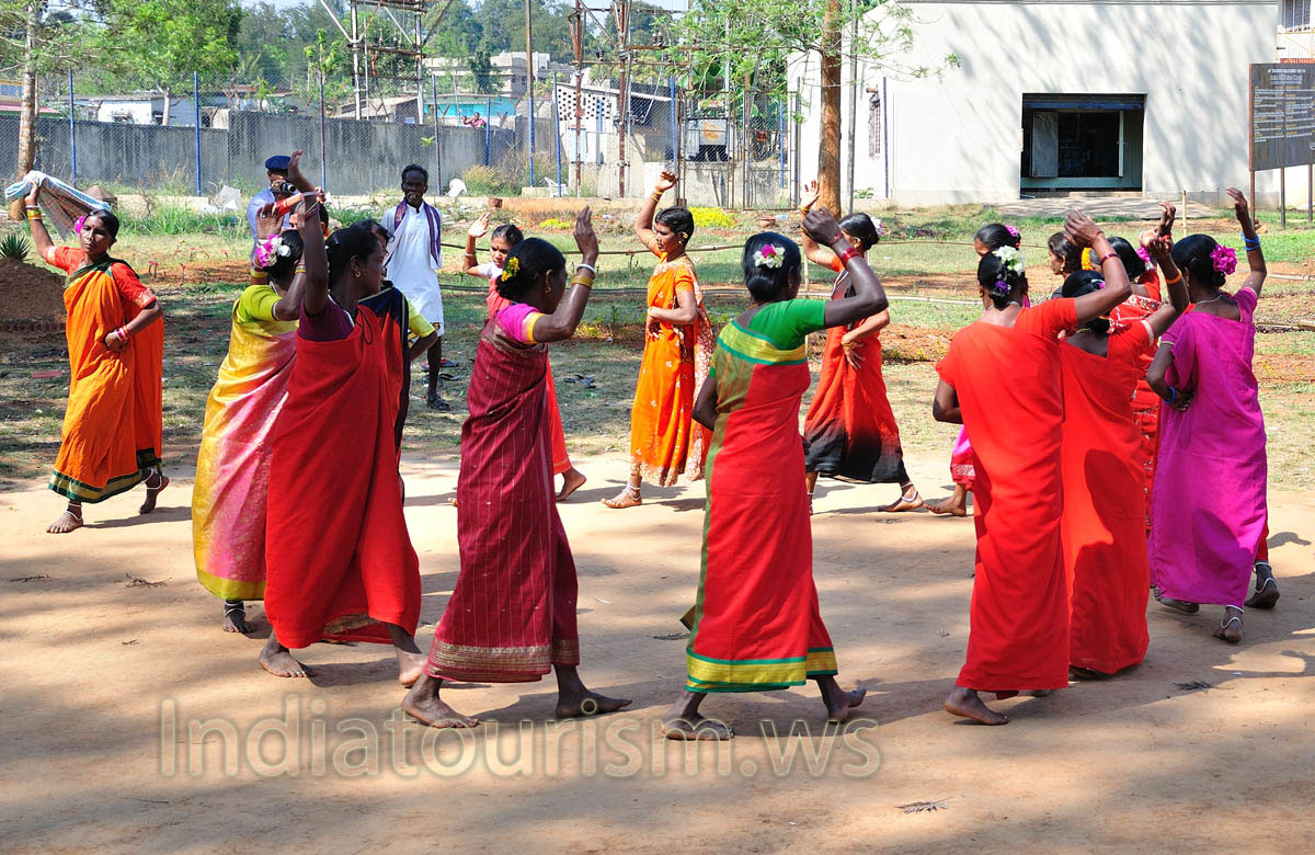 women are dancing by circle