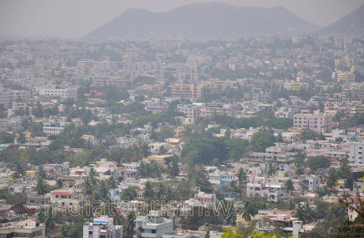 There is a mountain at the rear of city view