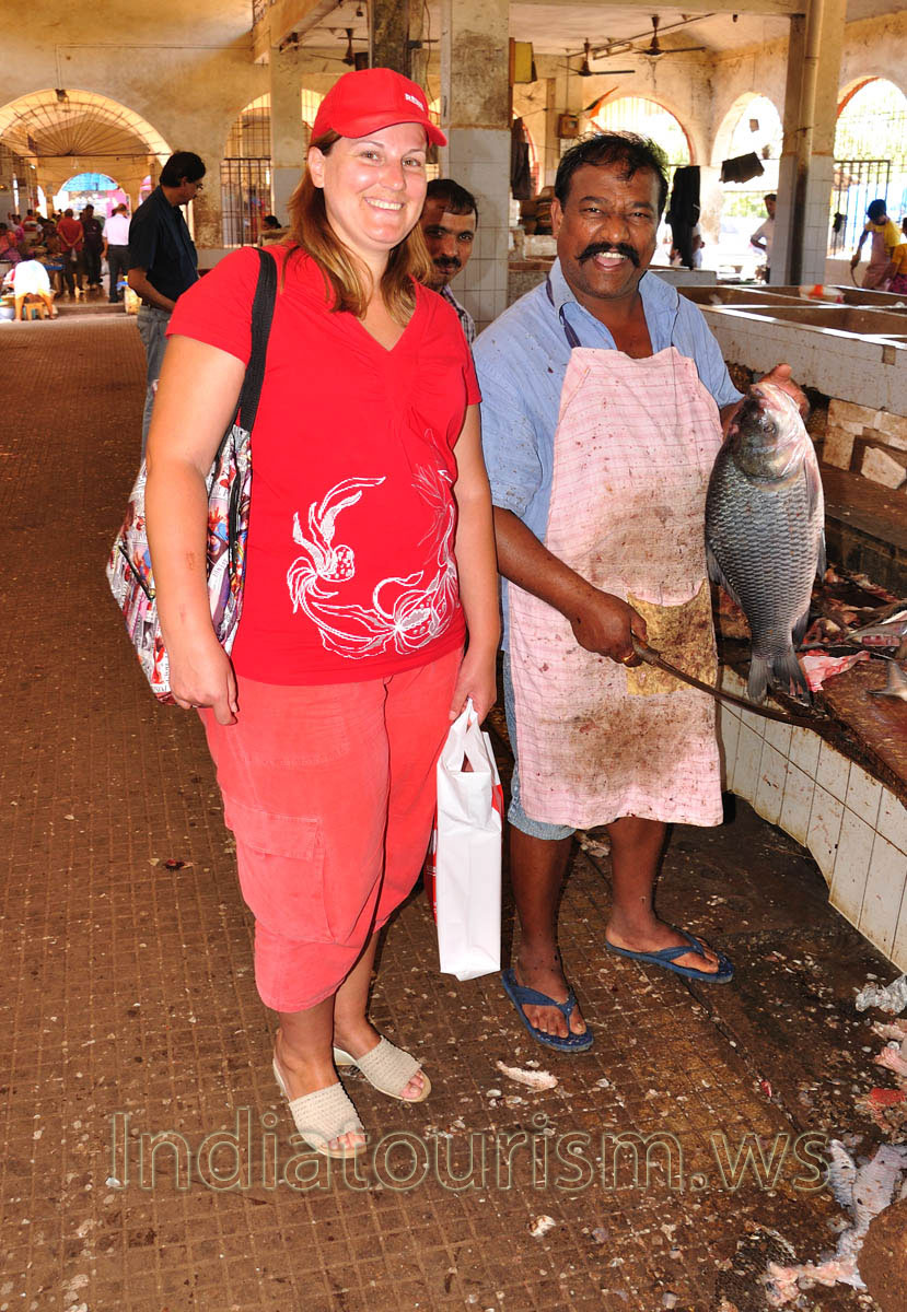 Fish Market: my wife and man who cuts the fish