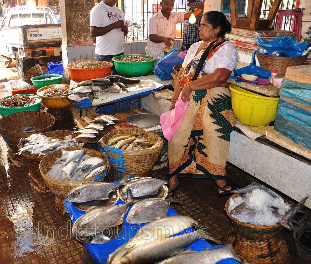 Market near K.B.S.: every basket with fish has filled with ice
