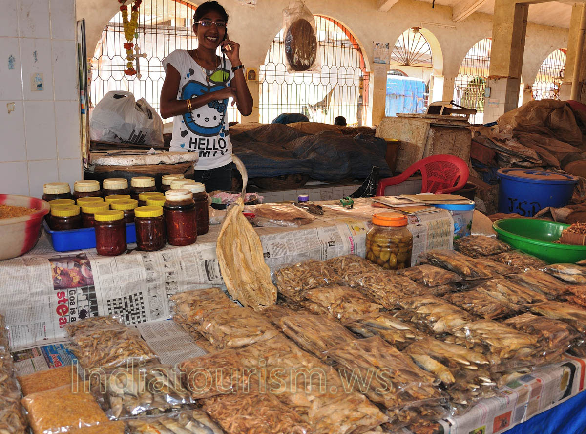Market near K.B.S.: young dried fish vendor