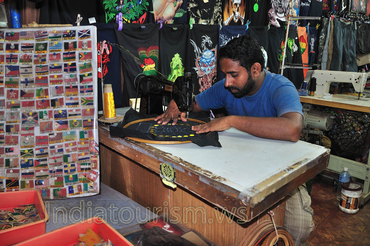 a man engaged in embroidery