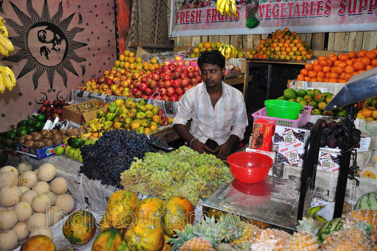 fruits: honeymelon, grape, papaya, mango, kiwi, pomegranates, apples and passion fruit