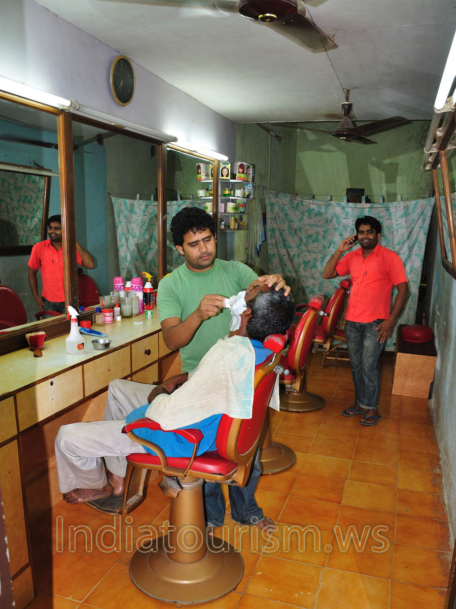 Barber shop: barber in the work process