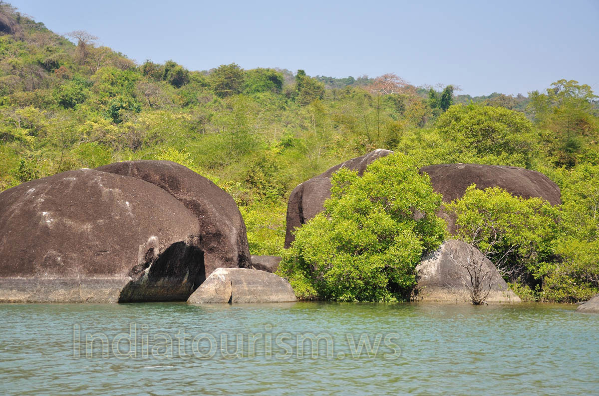 several rocks in the lake