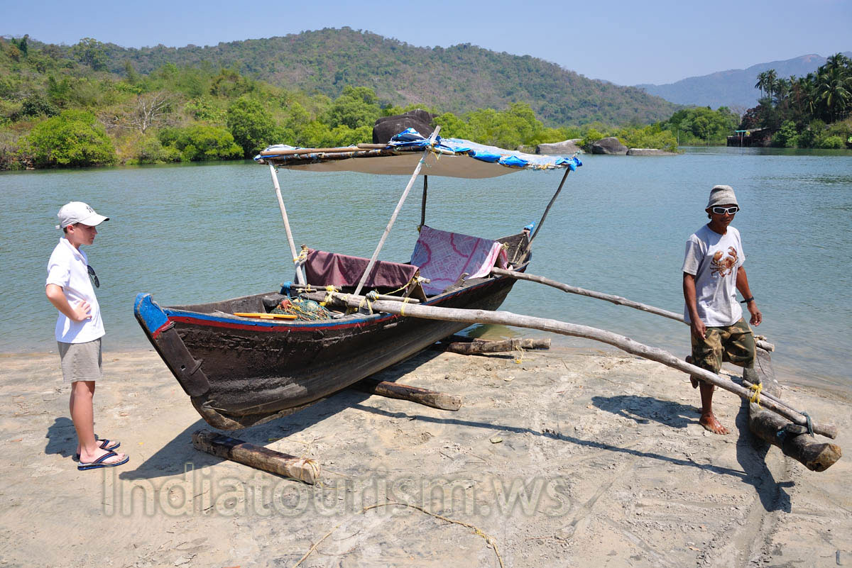 My son is watching attentively to all actions of the crab's catcher