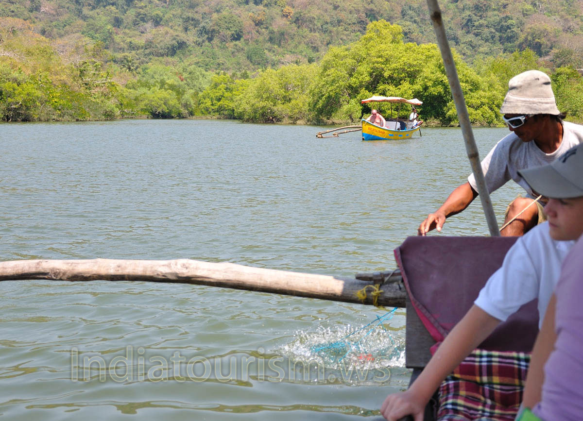 crab catcher pulls the crab trap from the water