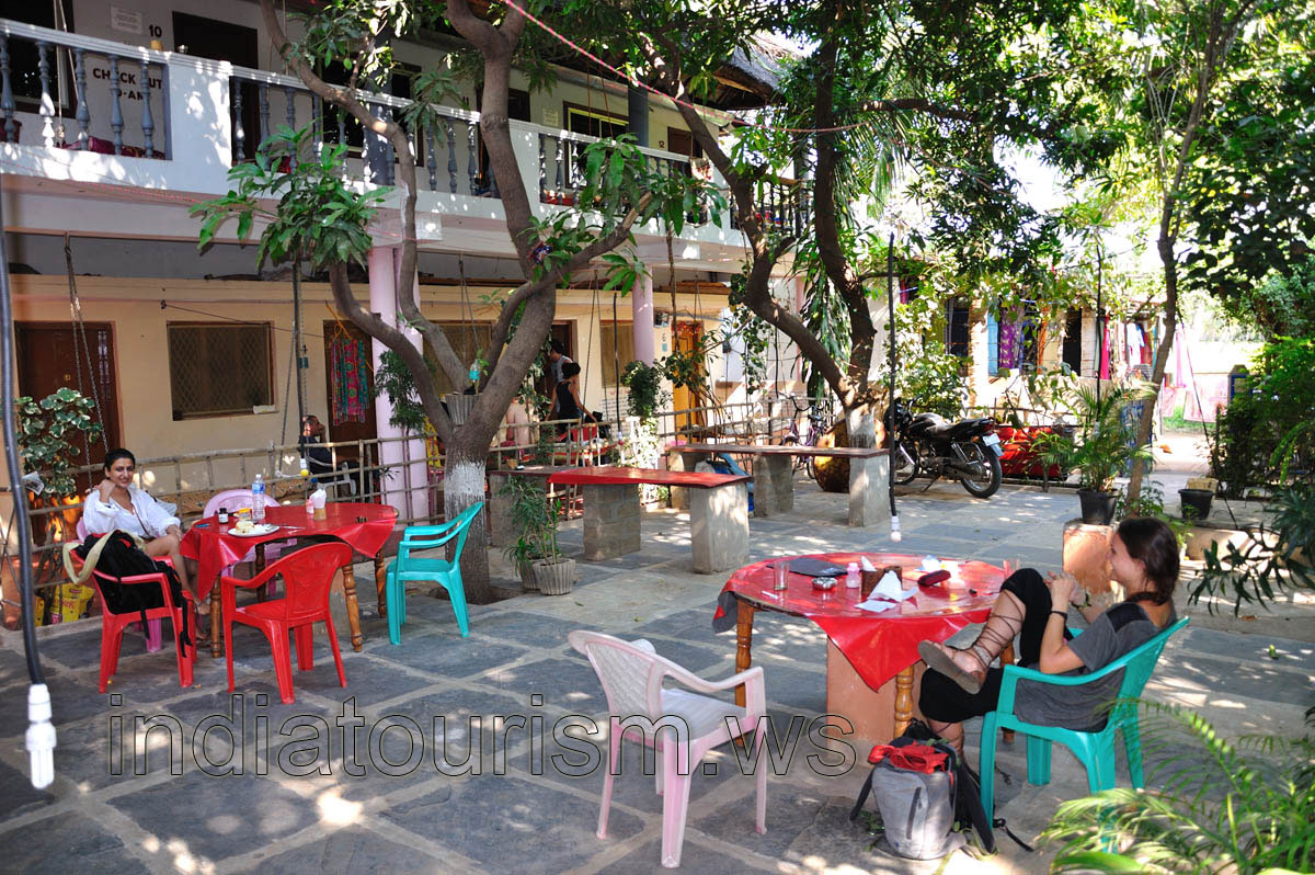 Sri Uma Shankar, open air cafe tables