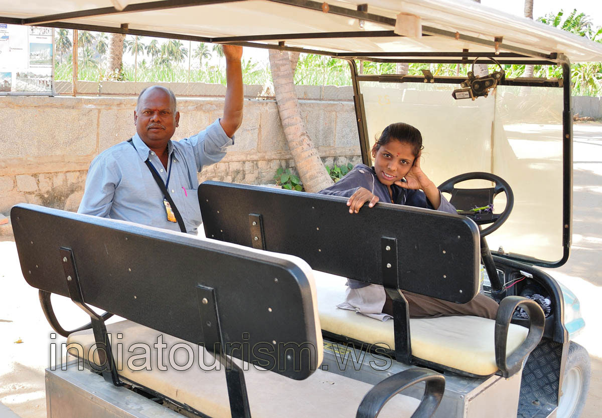 Ticket vendor and driver of the electric car
