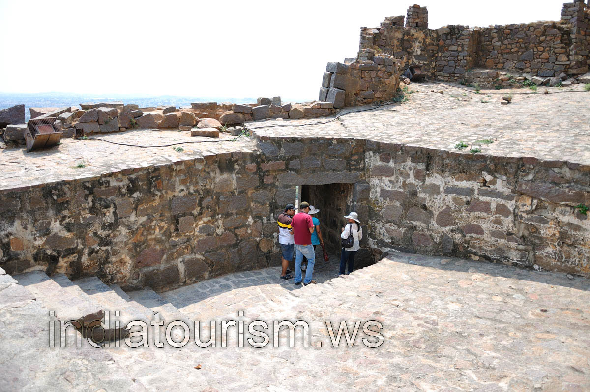 Tourists return down to the entrance