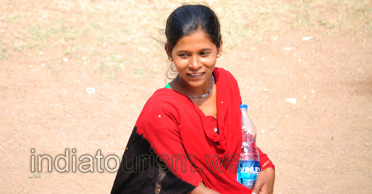 Young indian girl with the bottle of water