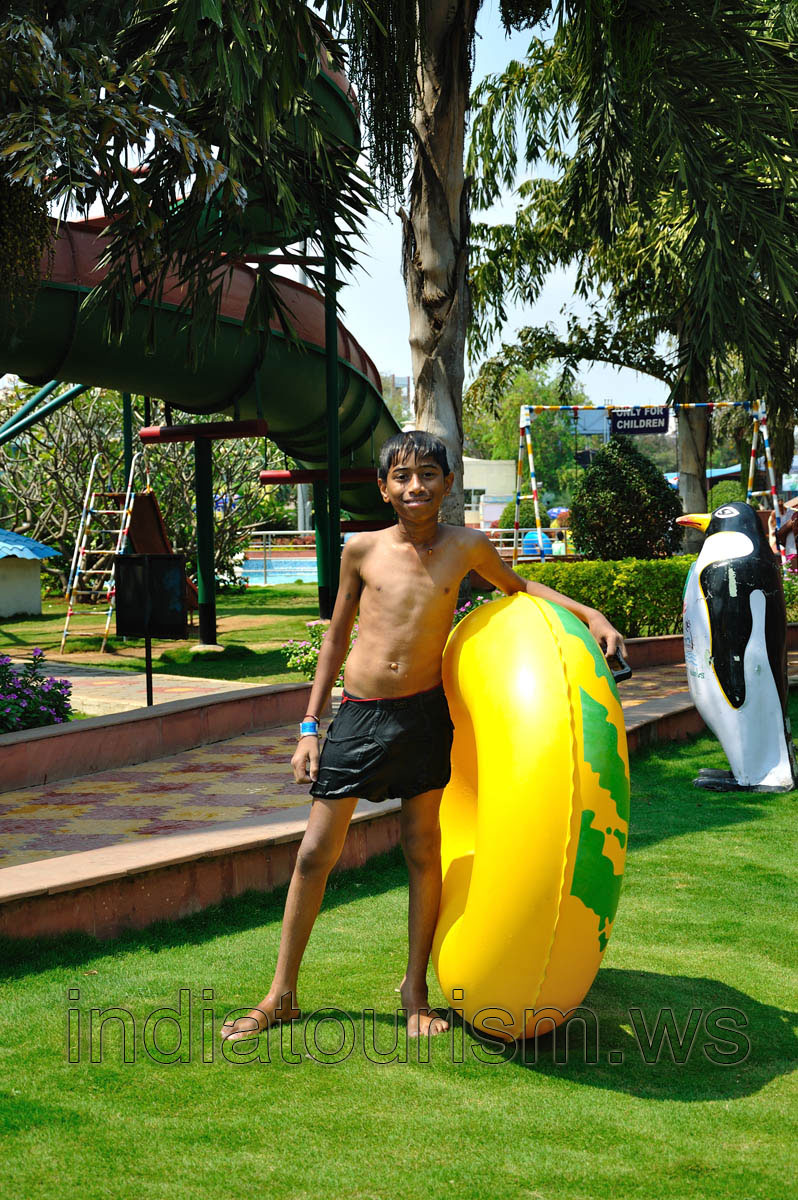 Indian boy with an inflatable swim ring