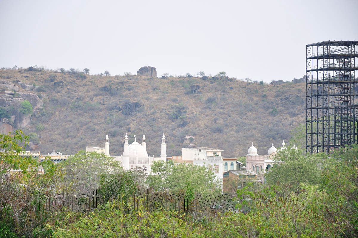 Transparent metallic construction with the stairs inside