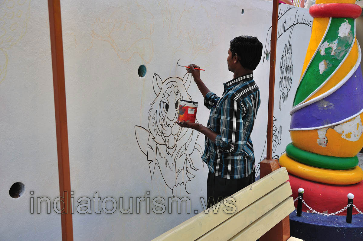 Painter at work beside the Borasura