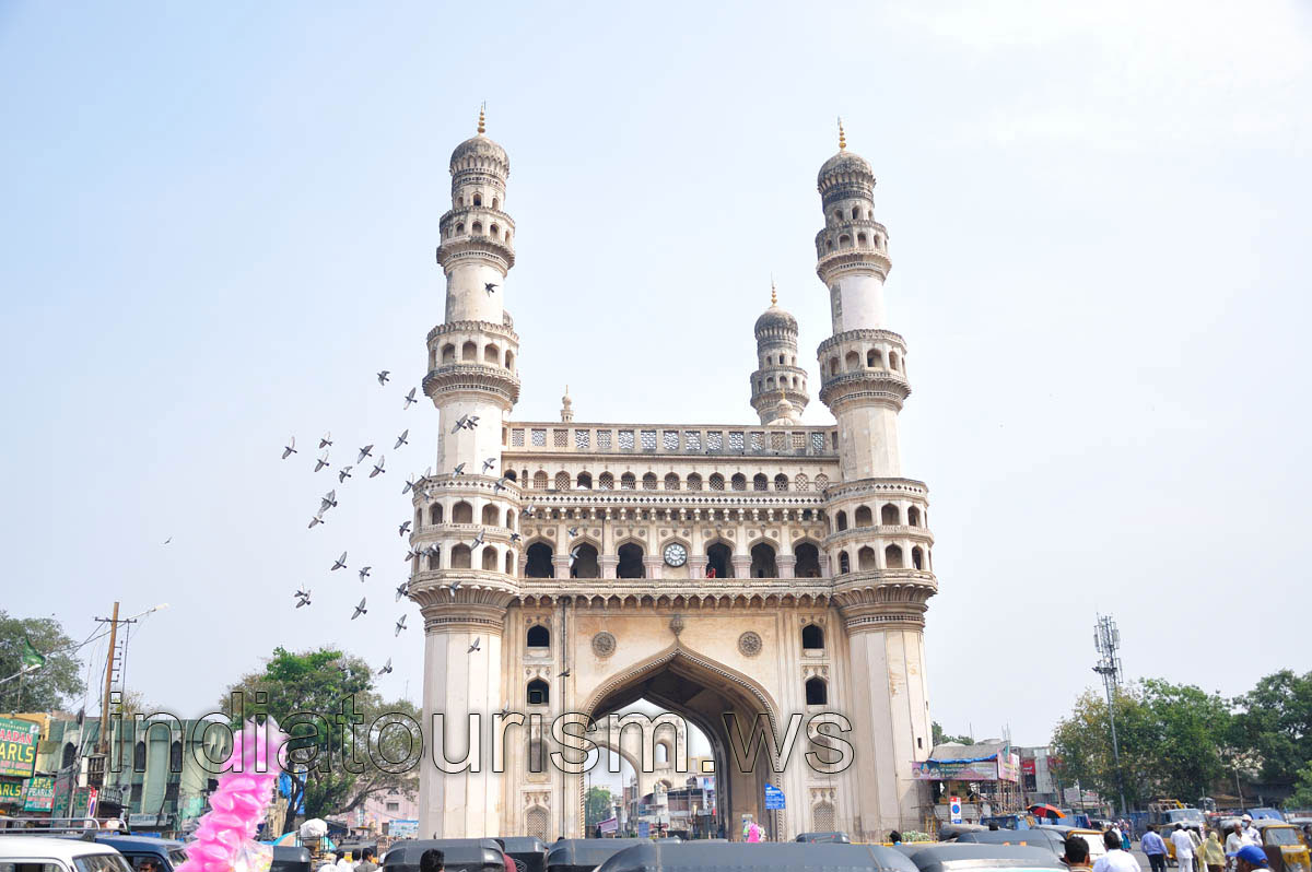 Charminar and flying pigeons