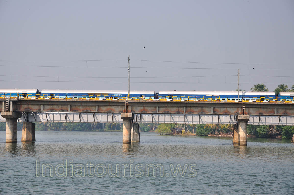 our ferry floats along the railway bridge