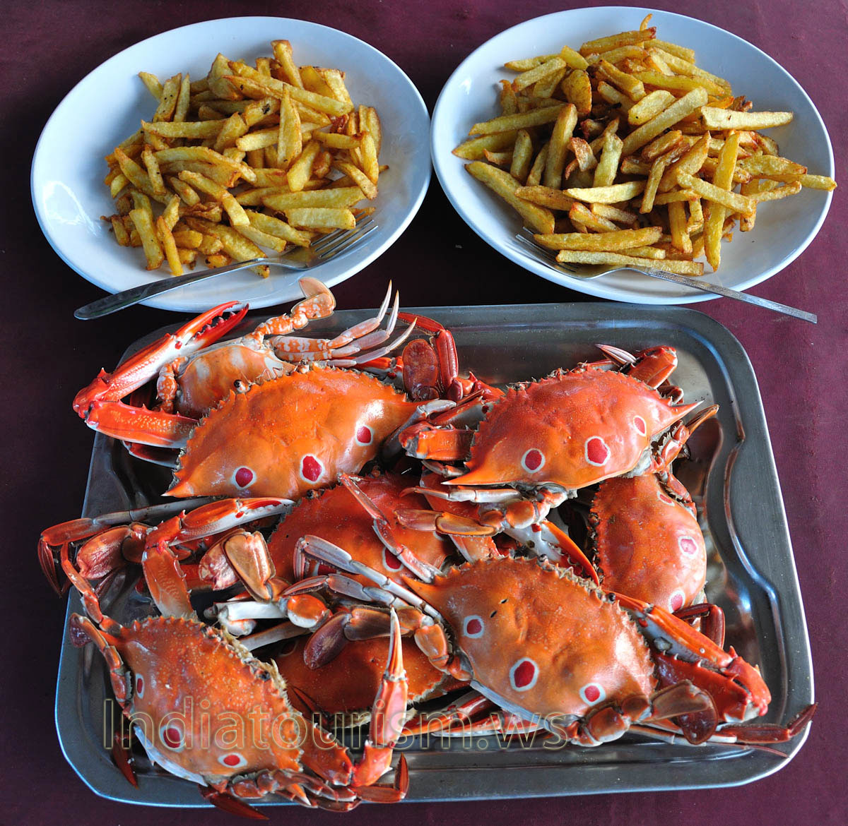 cooked crabs with three large dots on each