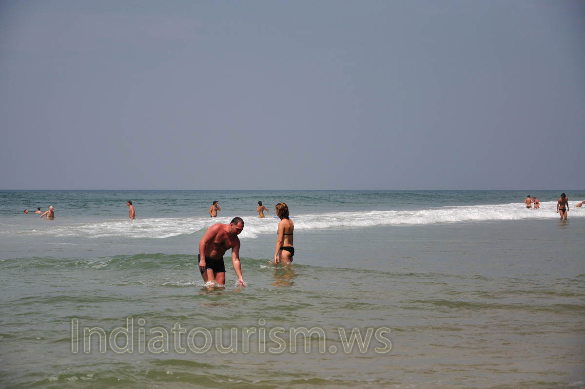 man touches the water