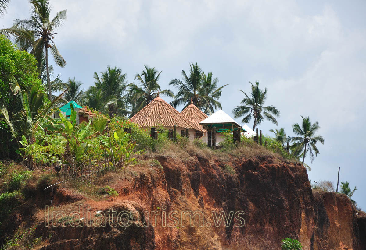 tourist houses on the top of the cliff