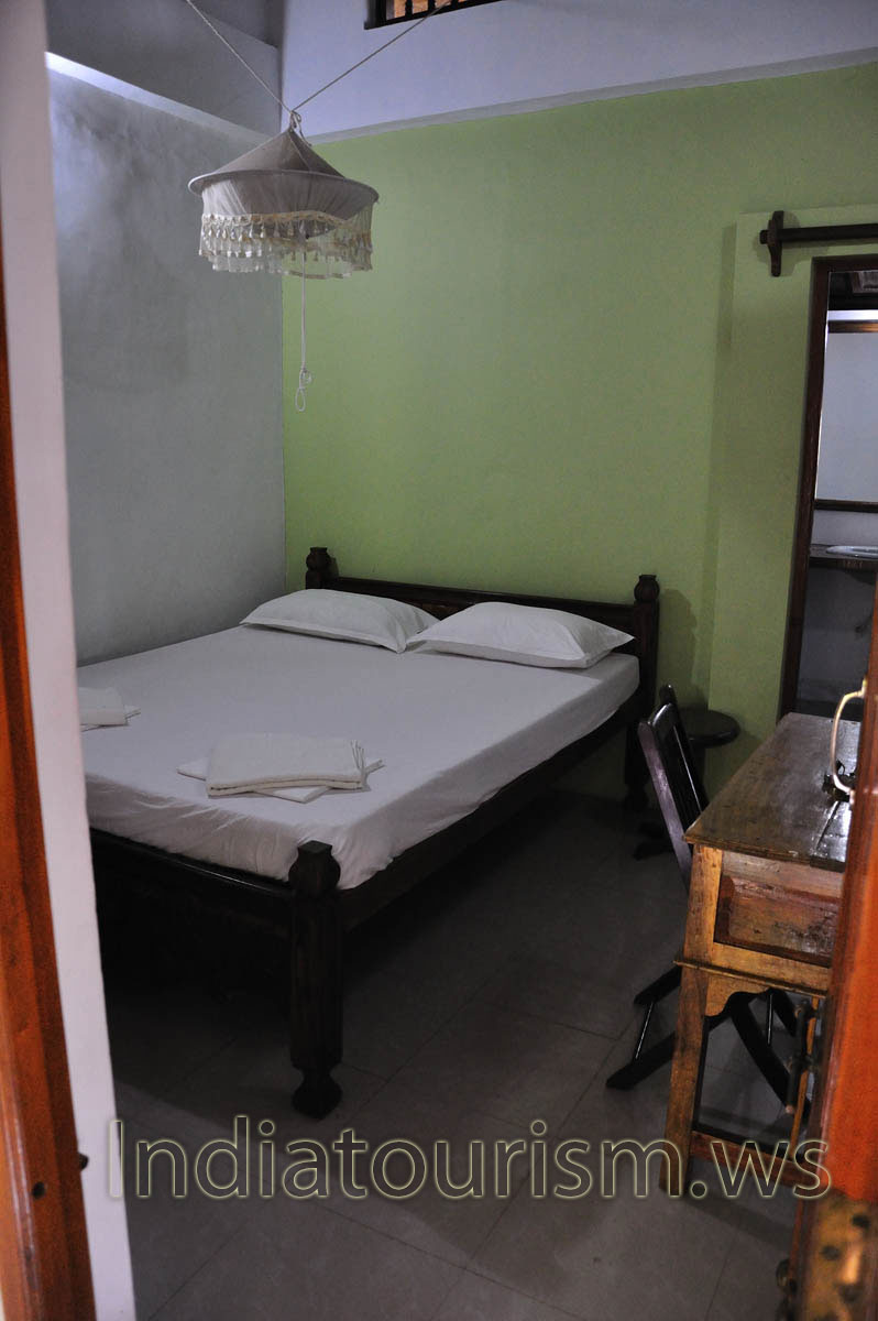 double bed in the small room