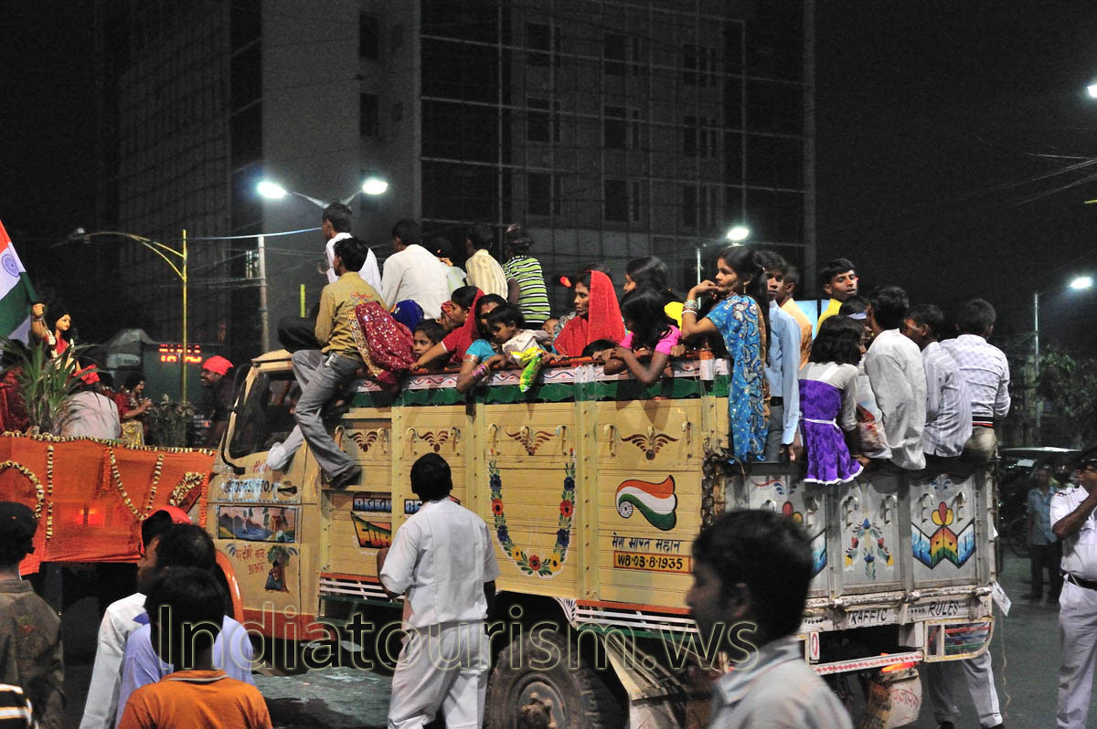 The big truck with the women and children at the festival