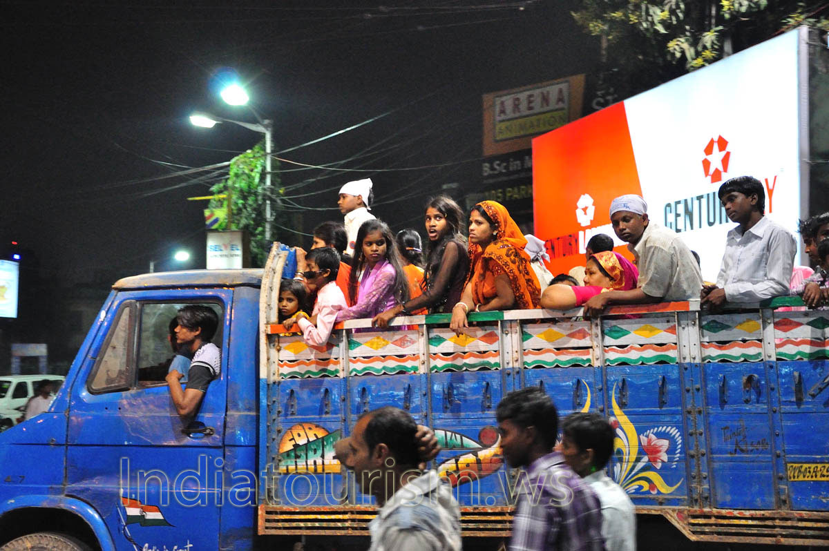during the festival streets are crowded with people and cars