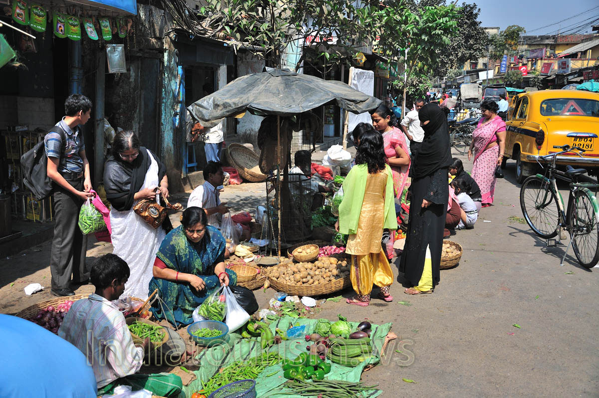 woman selects the vegetables for cooking lunch