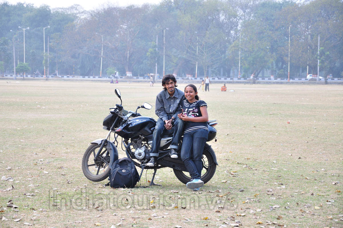 A young couple came to rest on the Maidan on a motorcycle
