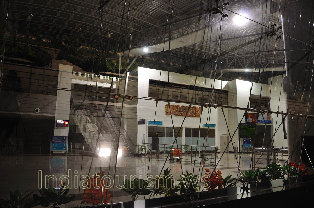 view of the madurai airport interior through the window