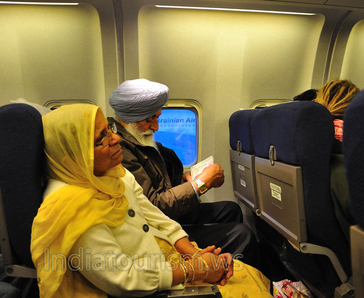 These are our neighbours in the time of flight to New Delhi