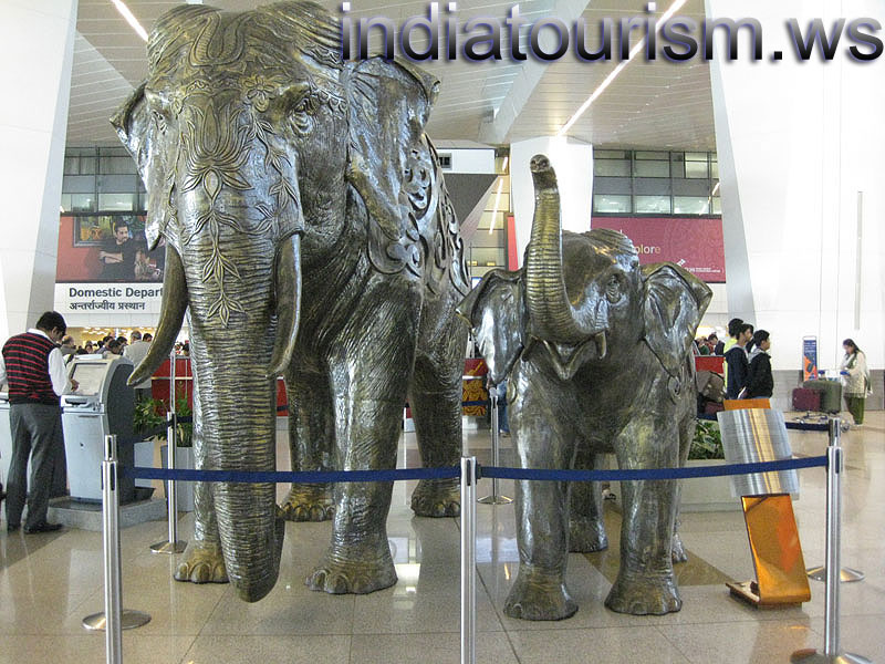 artificial elephants are near the Domestic Departure section