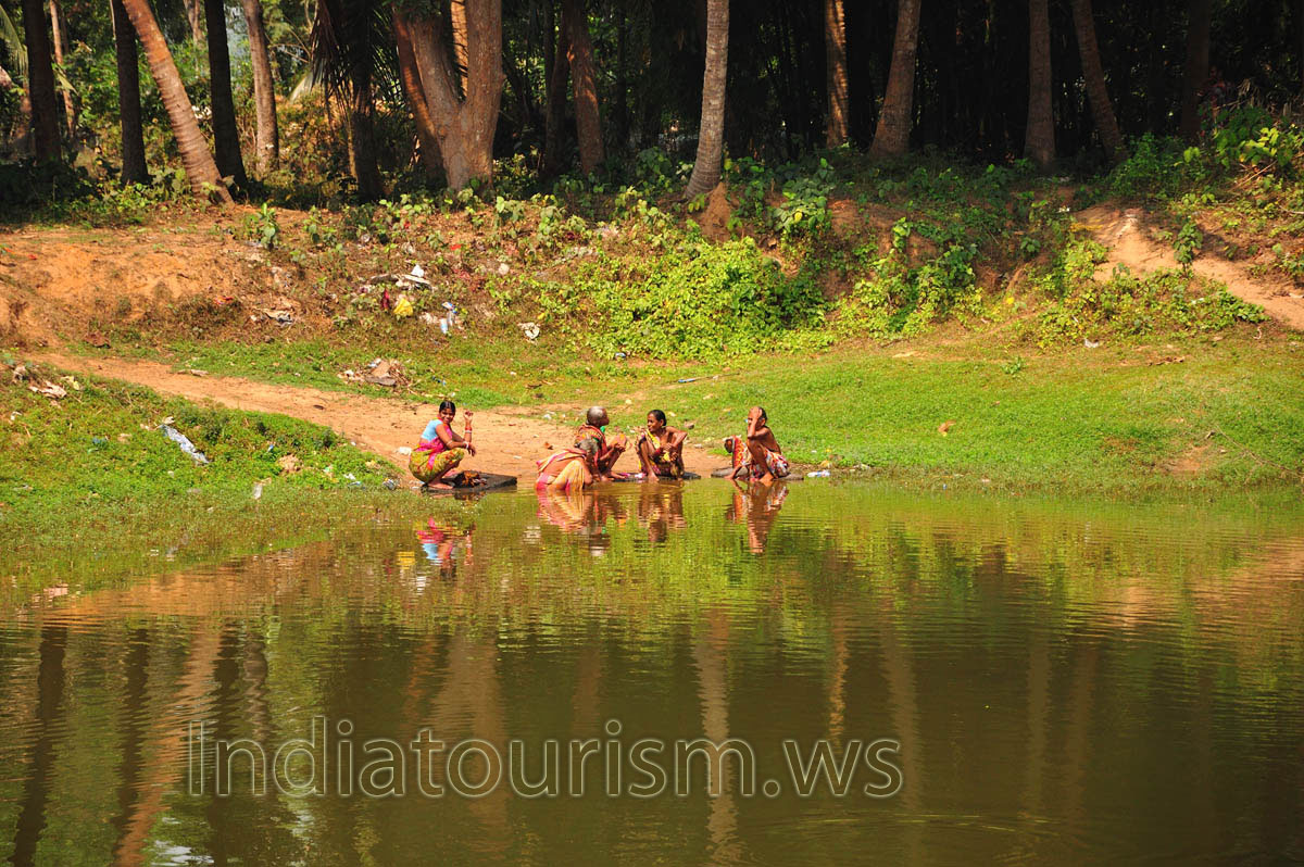 women sitting in the water