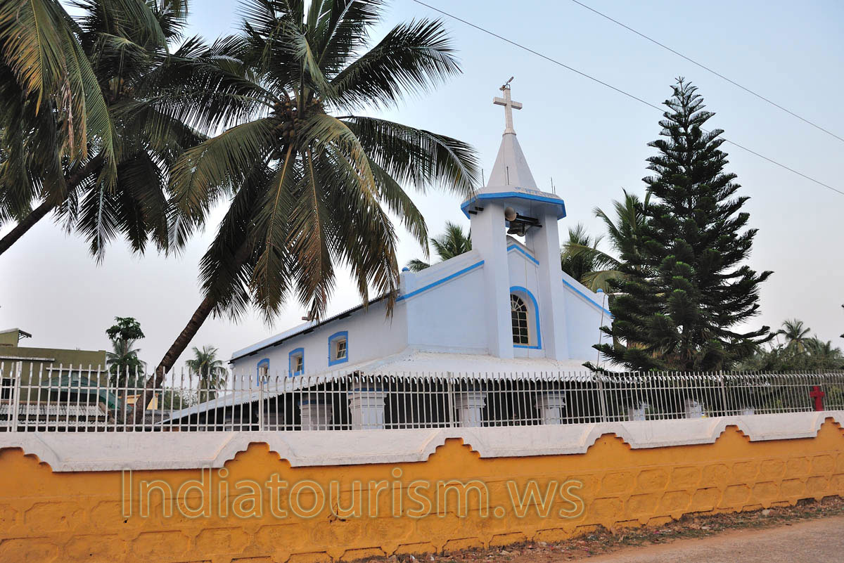 There is a bell at the top of the church building
