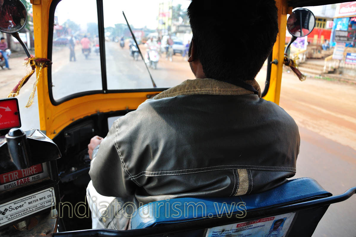 This is the driver of our auto rickshaw on the way from Bhubaneshwar to Puri