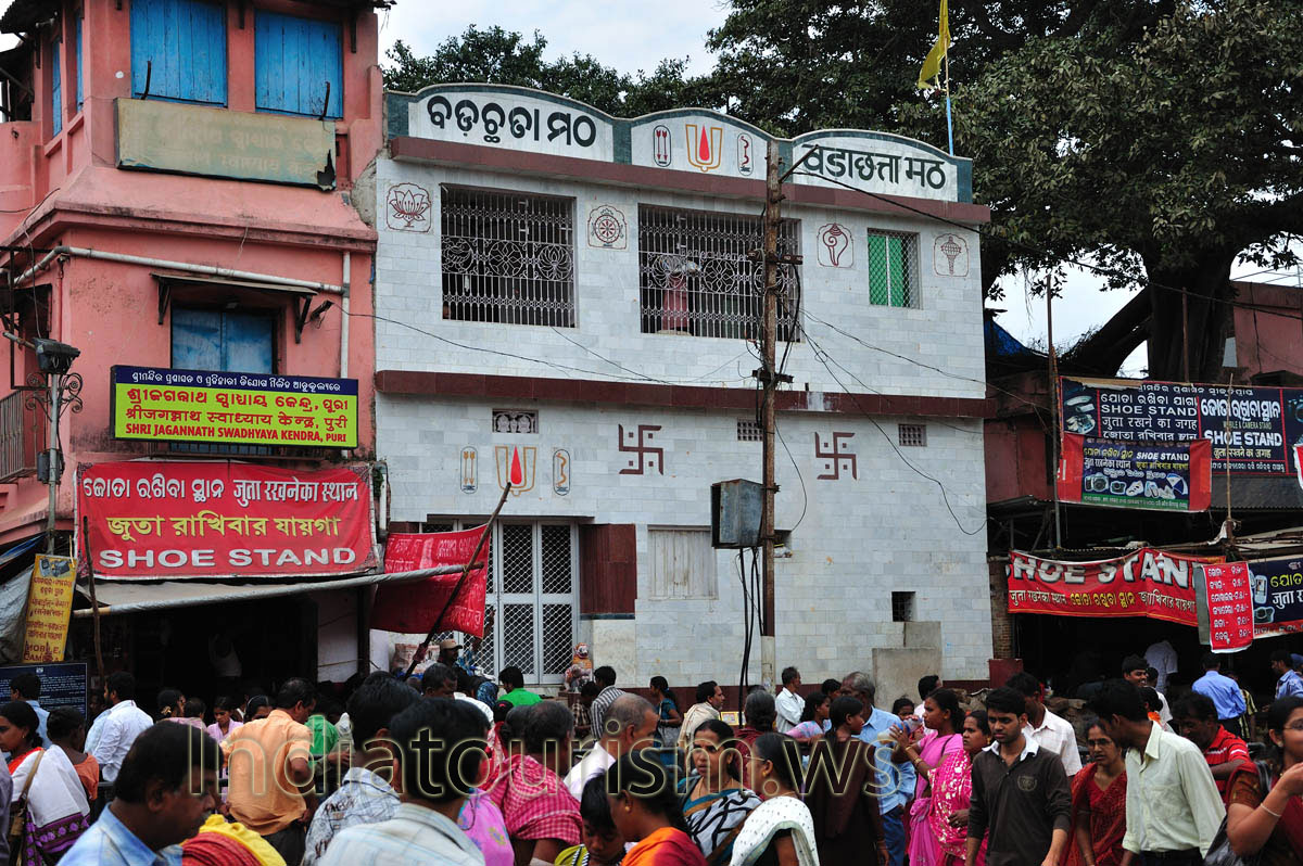 There are symbols of Jainism on the wall