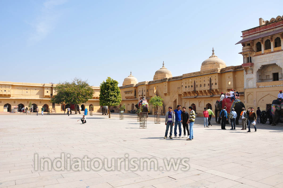 The elephants with tourists on their backs passed through Suraj Pol entrance