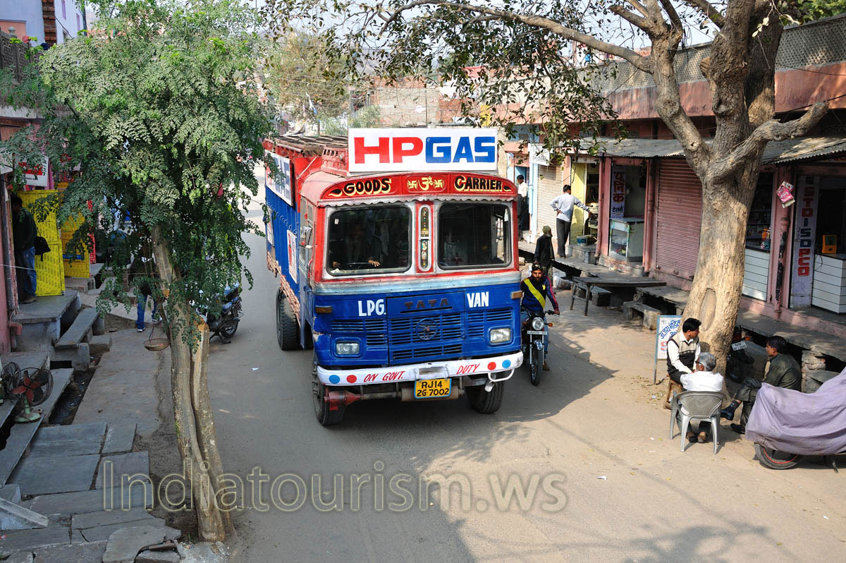 We are sitting on the elephant even higher the roof of the bus